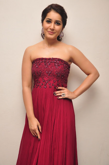 Rashi Khanna Stills At Movie Success Meet In Maroon Gown 29